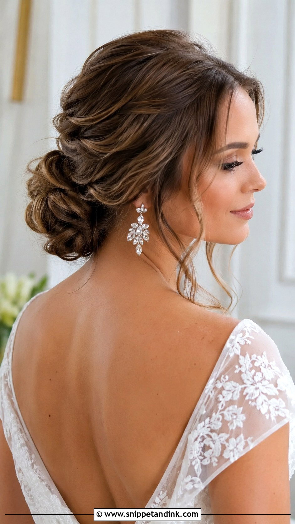 Low Bun With Volume on Top - Snippet and Ink - 20 Low Loose Bun Wedding Ideas
