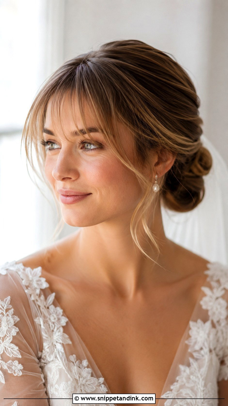 Low Bun With Wispy Bangs - Snippet and Ink - 25 Low Bun Wedding Hair Front View Ideas