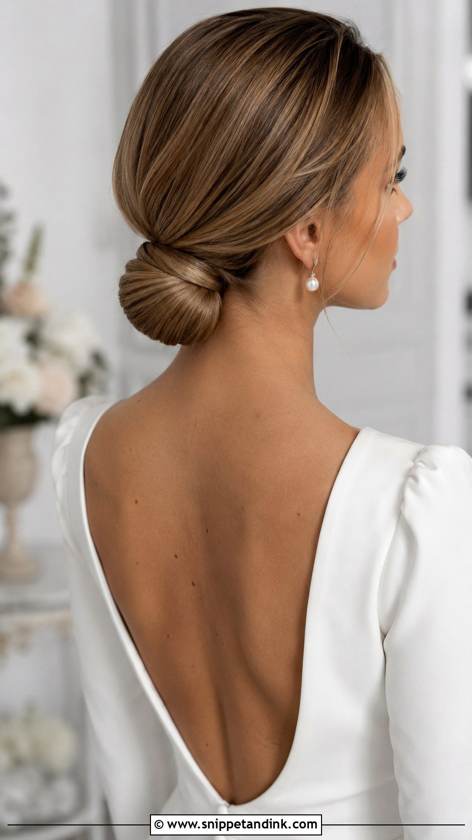 Low Bun With Wrapped Hair Base - Snippet and Ink - 35 Low Bun Wedding Hair Ideas