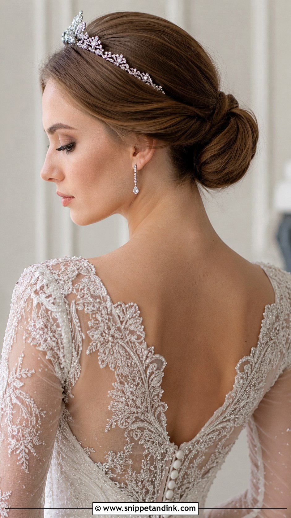 Low Bun With a Bridal Tiara - Snippet and Ink - 25 Simple Low Bun Wedding Hair Ideas