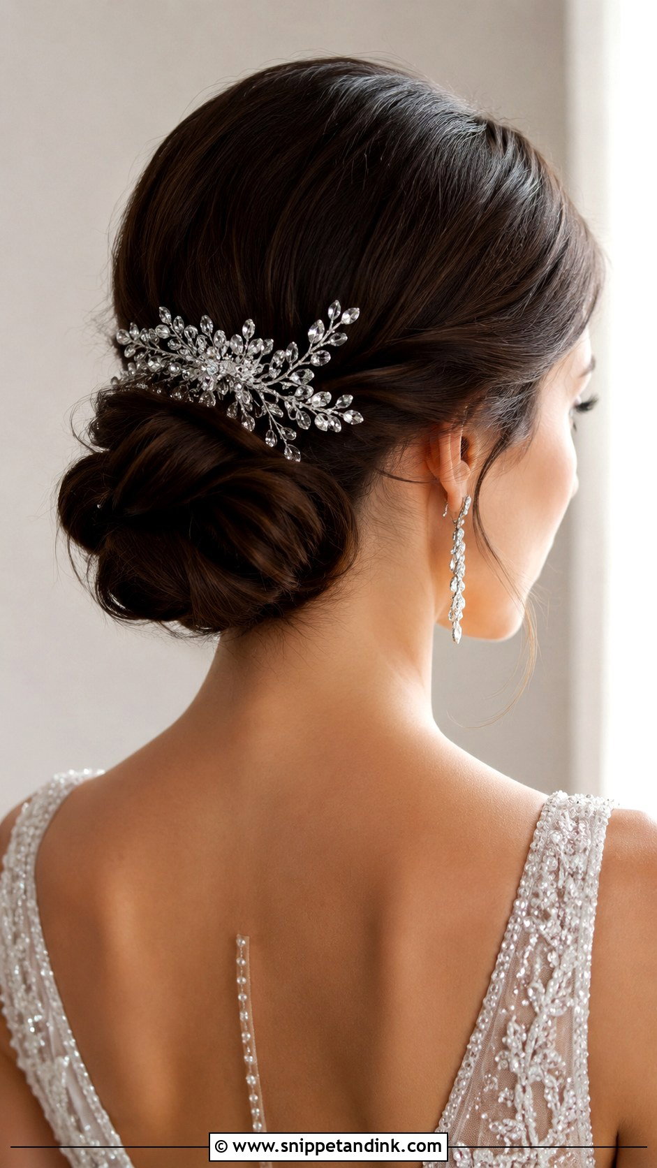 Low Bun With a Crystal Comb - Snippet and Ink - 20 Low Loose Bun Wedding Ideas