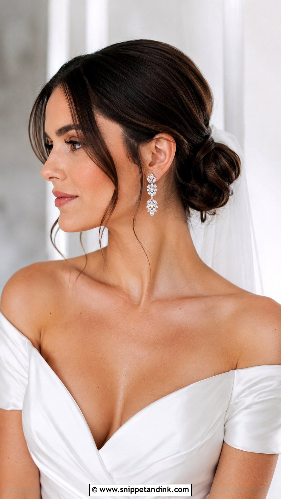 Low Bun with Face Framing Tendrils - Snippet and Ink - 25 Wedding Hairstyles for Round Faces