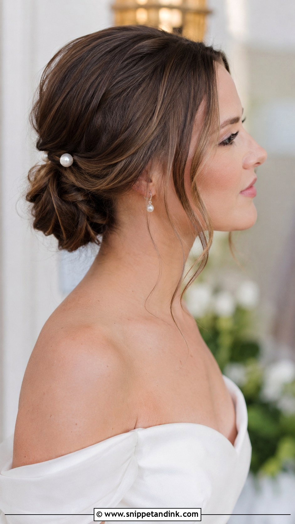 Low Bun with Face Framing Tendrils - Snippet and Ink - 30 Hair Styles for Long Hair for Weddings