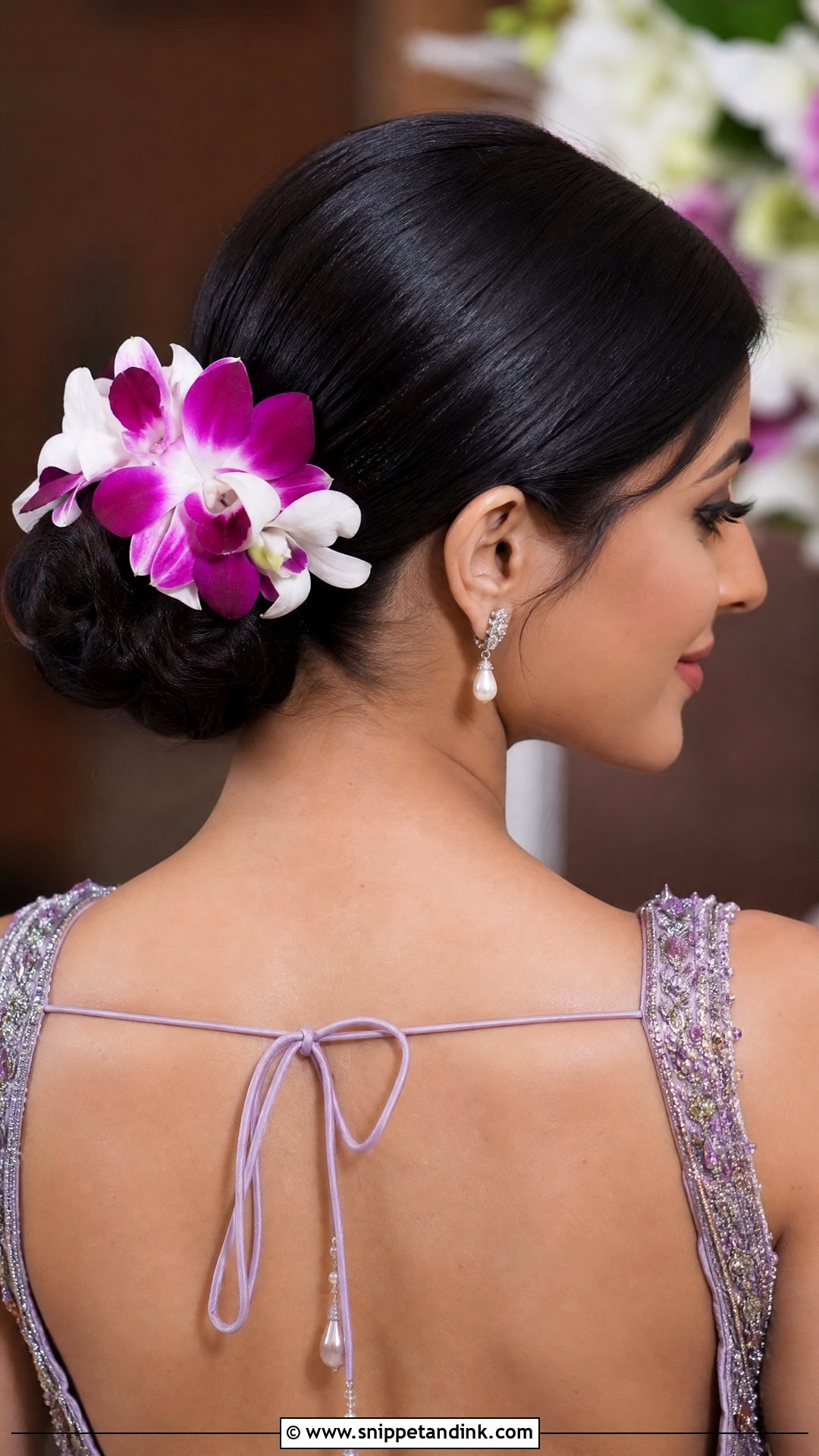 Low Bun with Orchids - Snippet and Ink - 20 Indian Flower Bridal Bun Hairstyles