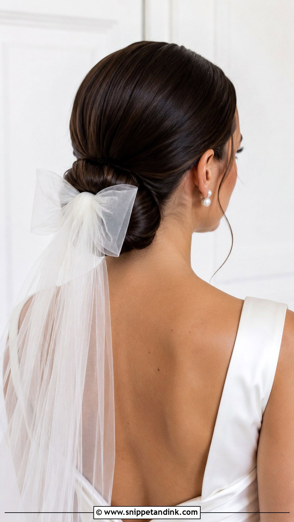 Low Chignon With Bow Veil - Snippet and Ink - 20 Wedding Hairstyles with Bow