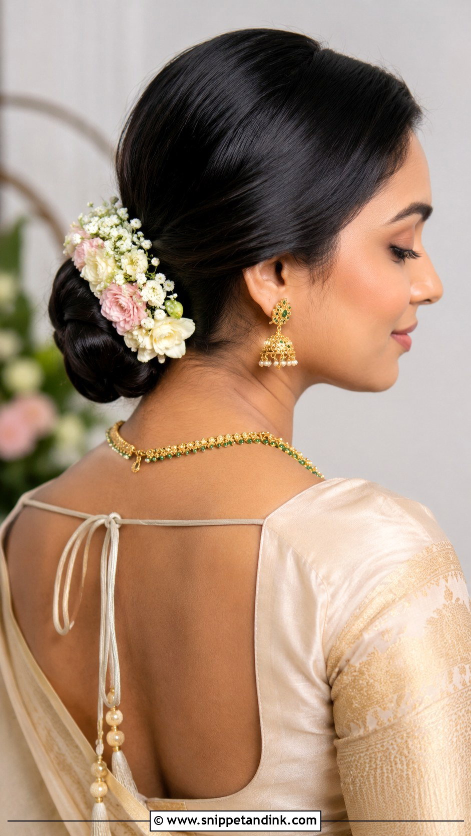 Low Chignon With Flowers - Snippet and Ink - 20 Simple Hairstyles for Indian Wedding