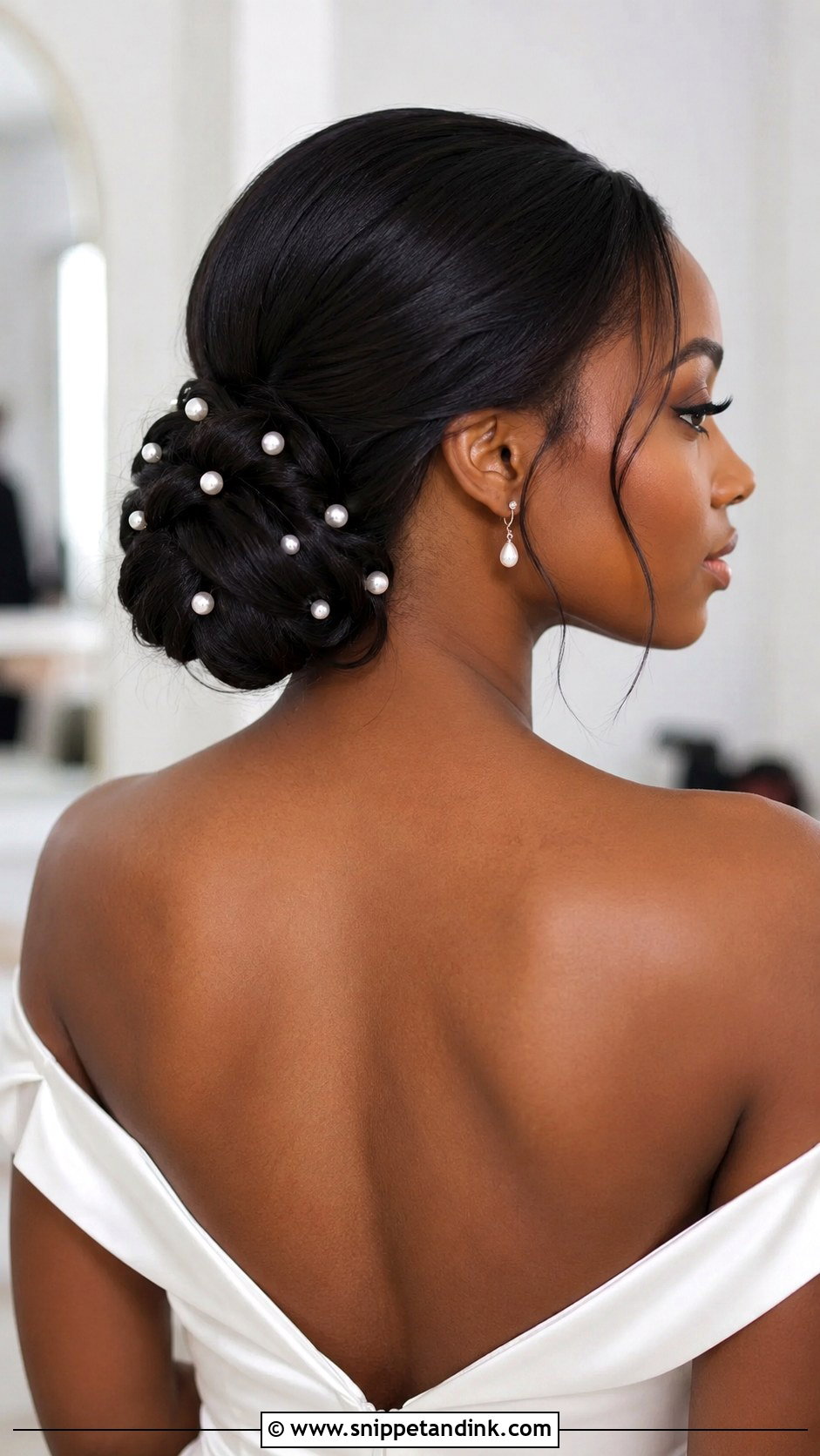 Low Chignon With Pearls - Snippet and Ink - 25 Wedding Hairstyles for Black Women