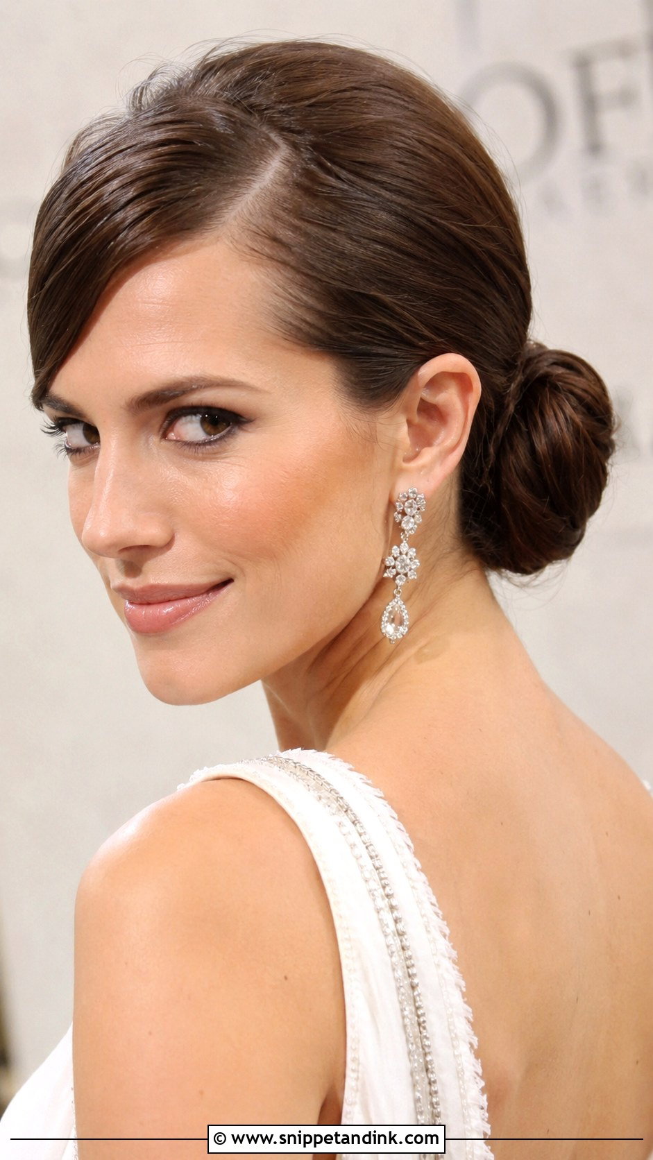 Low Chignon With Side Part - Snippet and Ink - 20 Rehearsal Dinner Hair for Bride Ideas