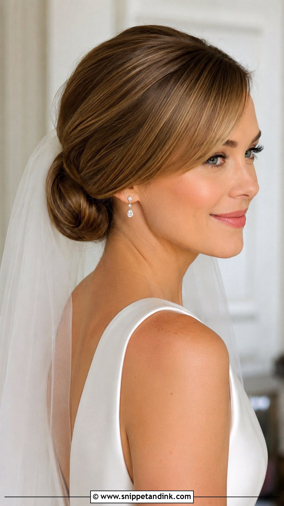Low Chignon With Side Swept Bangs - Snippet and Ink - 20 Hairstyles with Bangs for Wedding