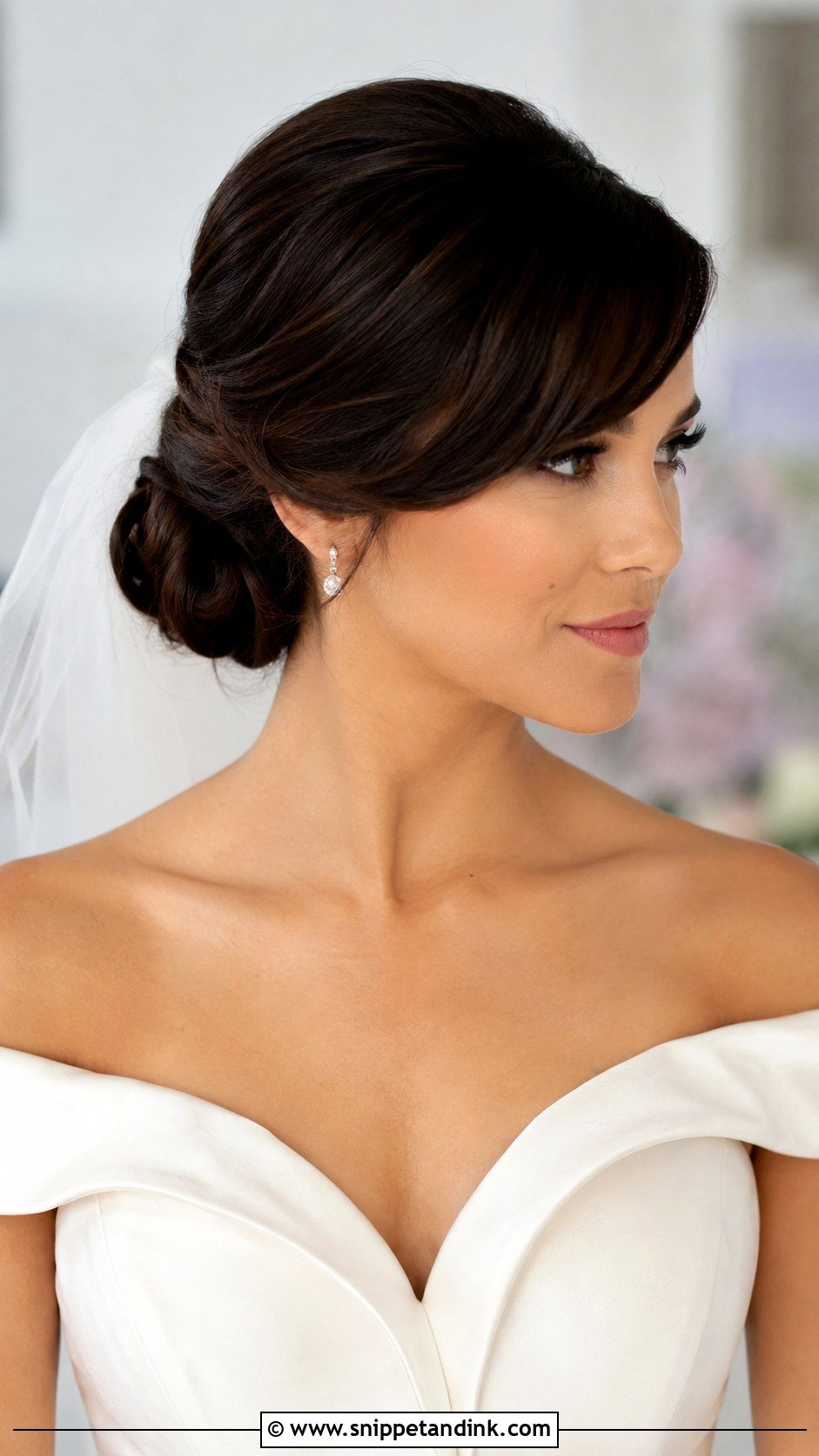 Low Chignon With Side Swept Bangs - Snippet and Ink - 20 Bridal Hair Front View Ideas