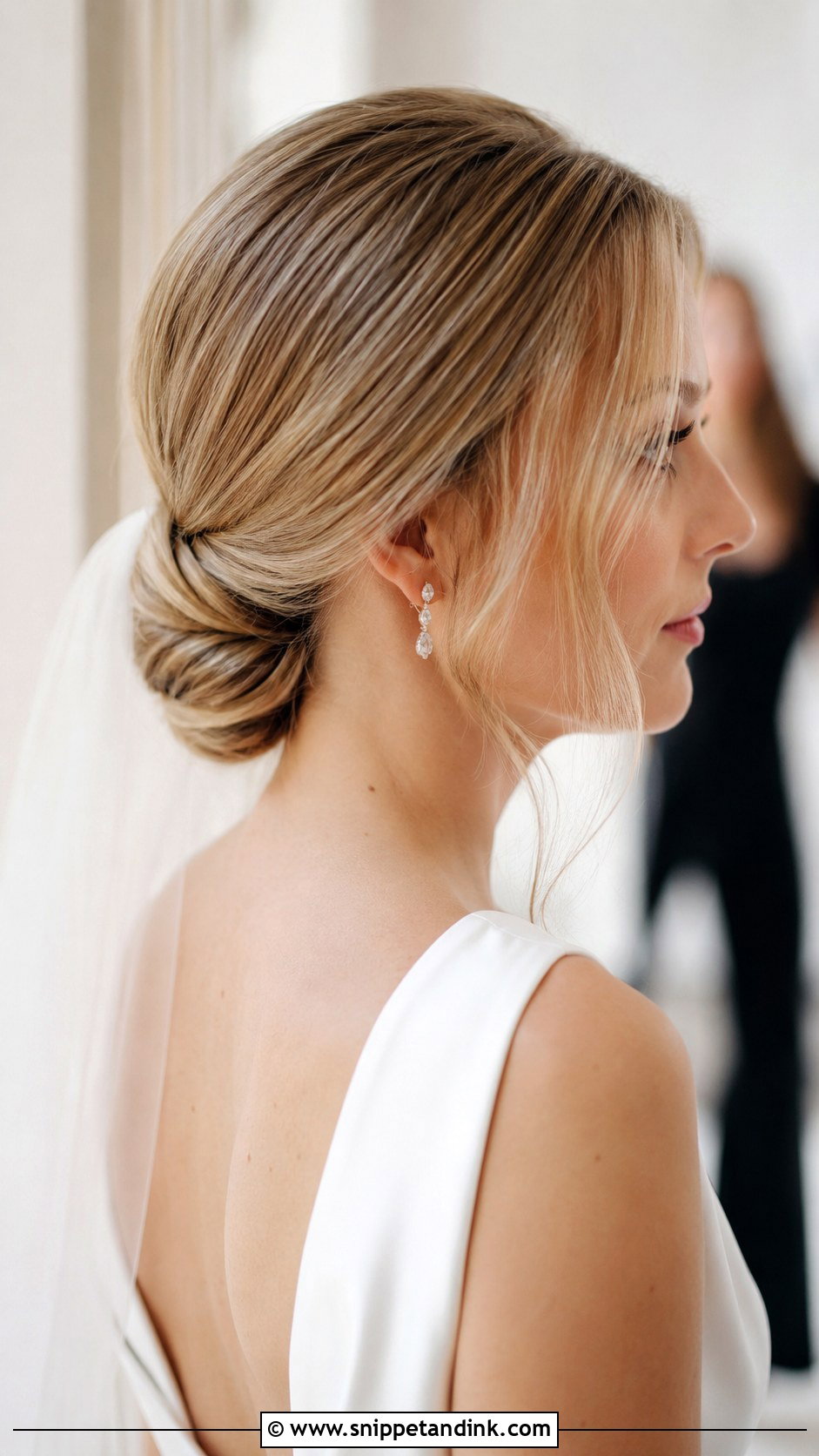 Low Chignon With Tendrils - Snippet and Ink - 25 Fine Hair Wedding Updo Ideas