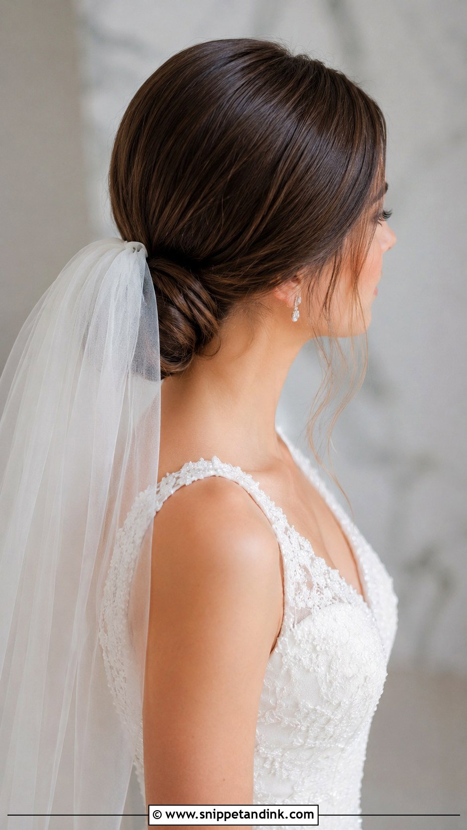 Low Chignon With Veil - Snippet and Ink - 25 Wedding Hair Looks