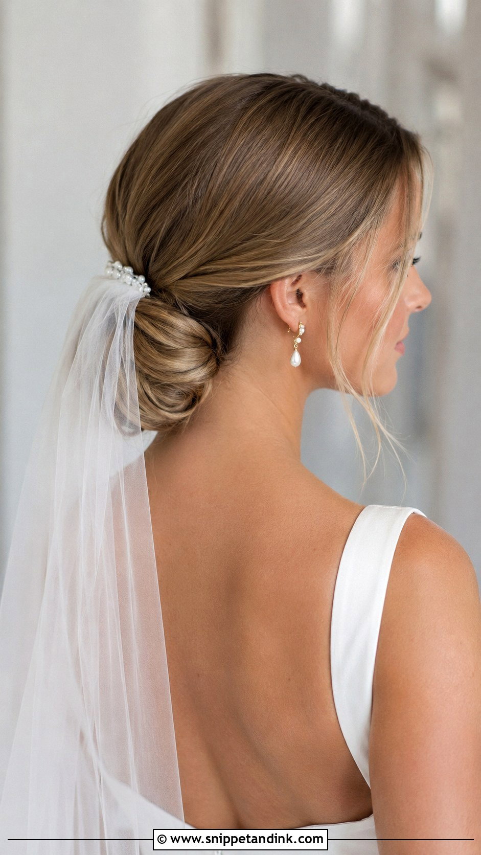 Low Chignon With Veil - Snippet and Ink - 20 Hairstyles with Veil