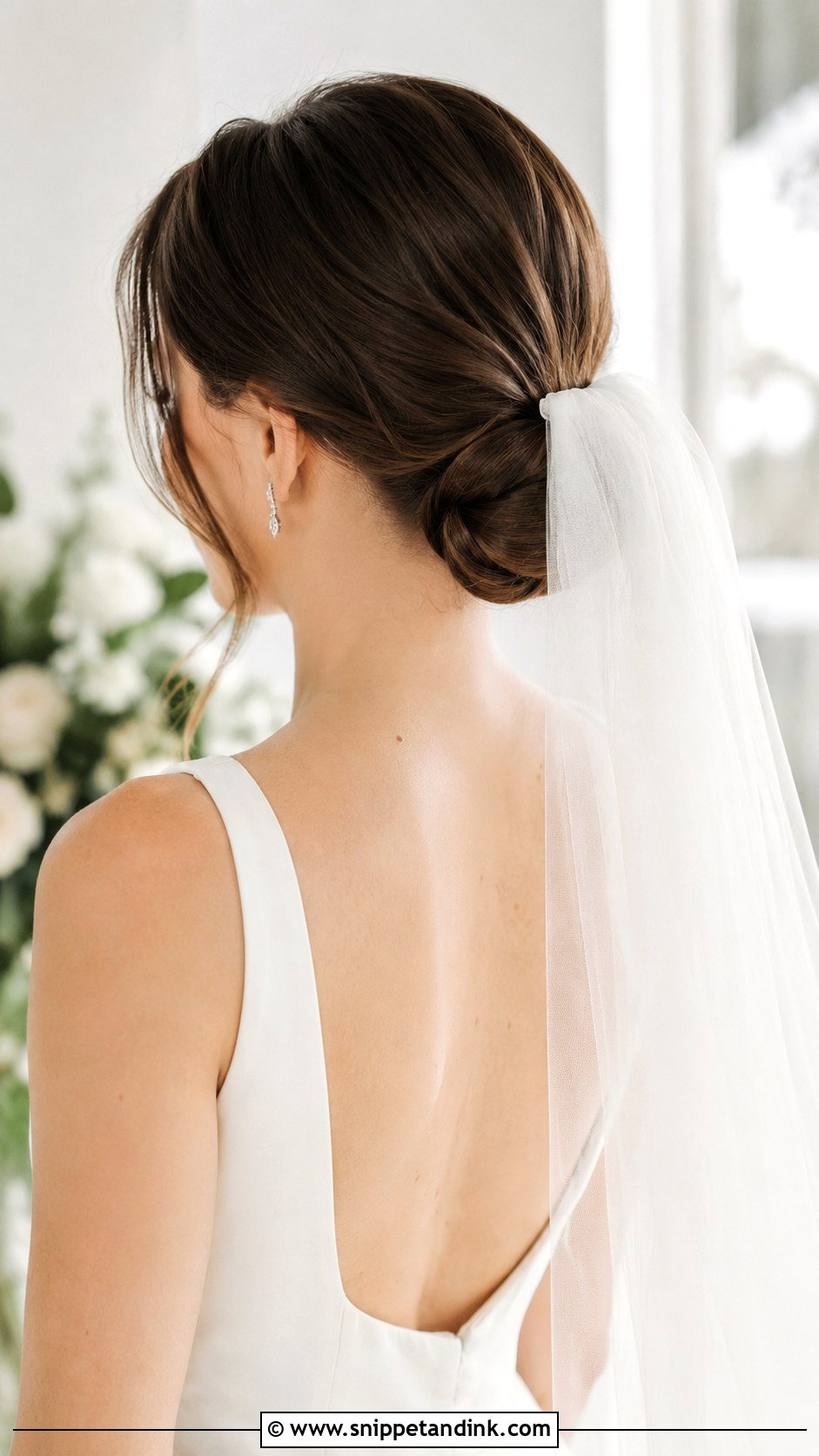 Low Chignon With Veil - Snippet and Ink - 20 Low Bridal Updo Ideas
