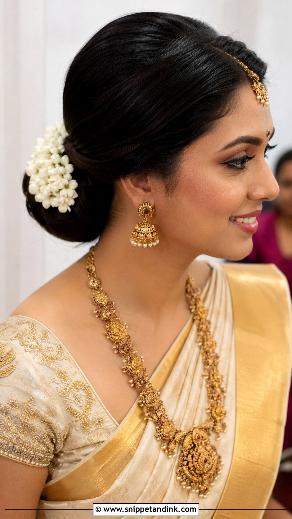 Low Chignon with Floral Accent - Snippet and Ink - 25 Kerala Hindu Bridal Hairstyles
