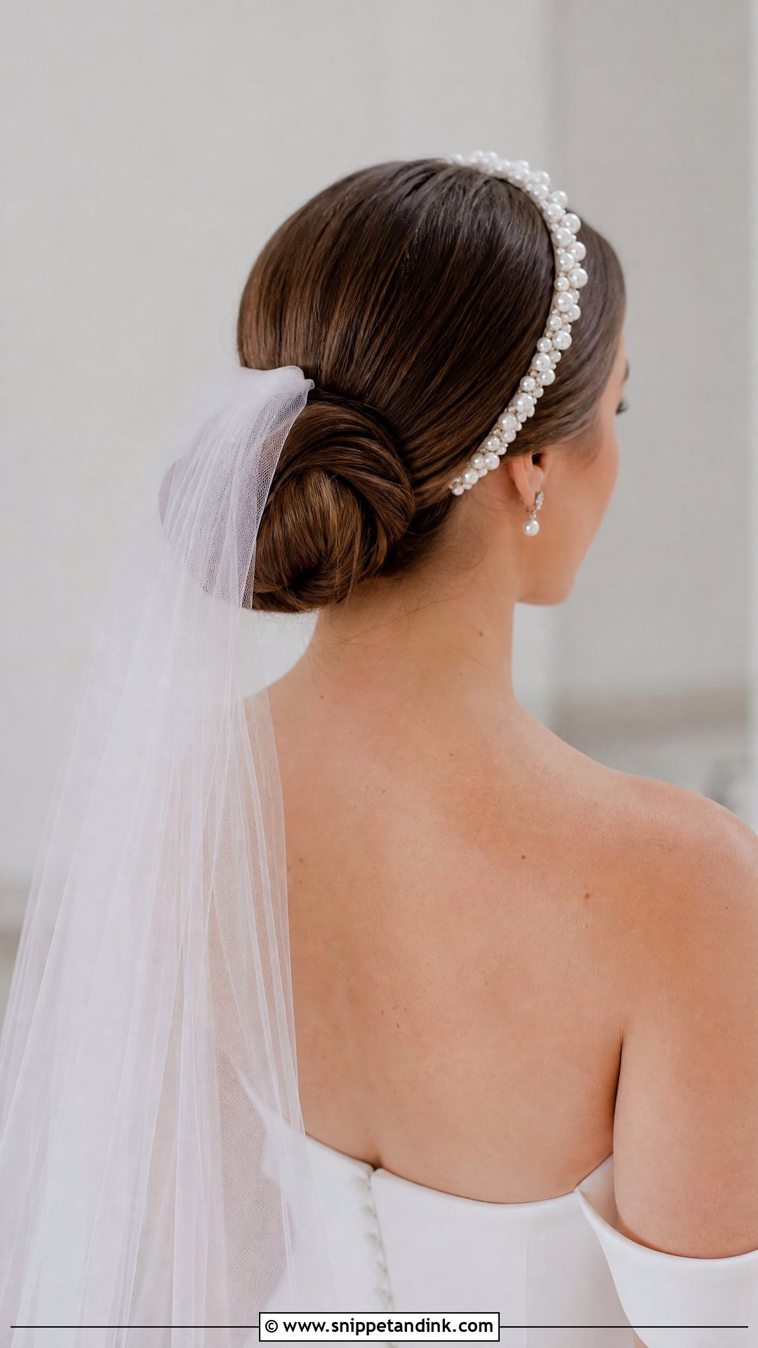 Low Chignon with Veil - Snippet and Ink - 20 Elegant Bride Hairstyles