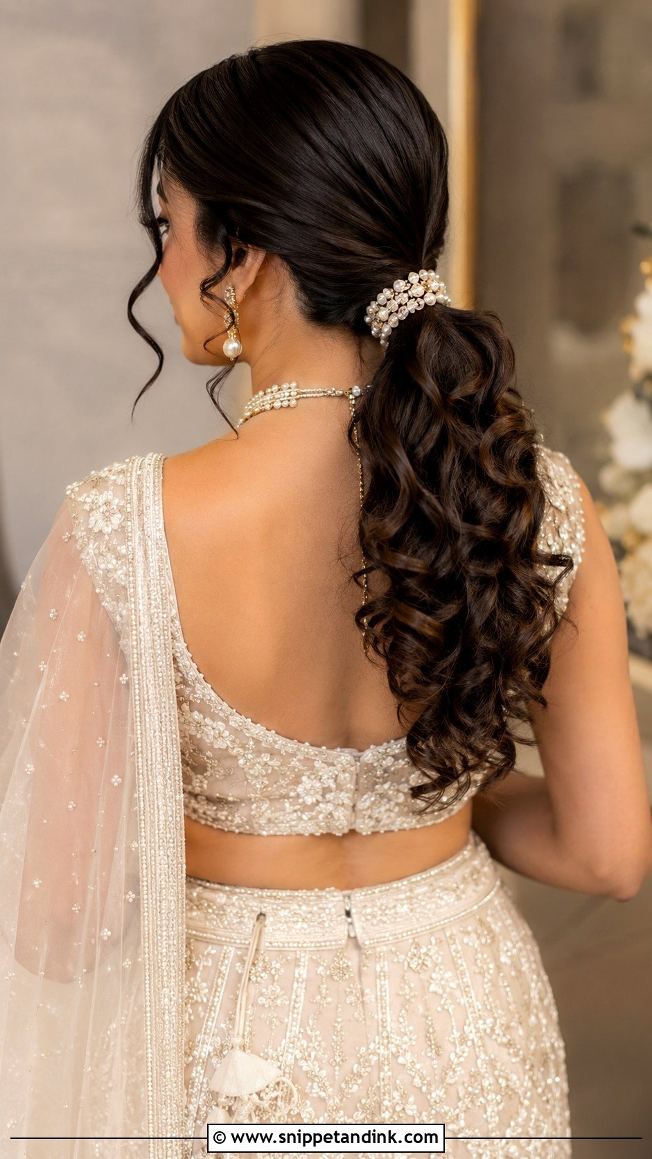 Low Curly Bridal Ponytail - Snippet and Ink - 20 Indian Curly Hair Bridal Hairstyles