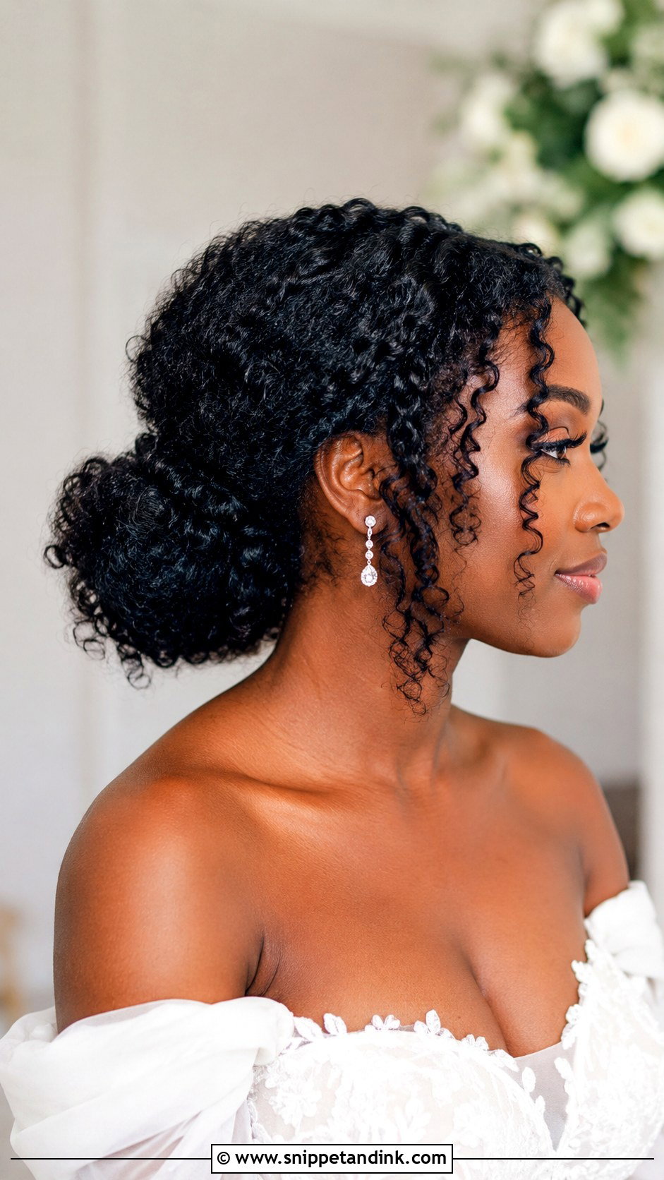 Low Curly Bun for Brides - Snippet and Ink - 30 Naturally Curly Bridal Hair Ideas