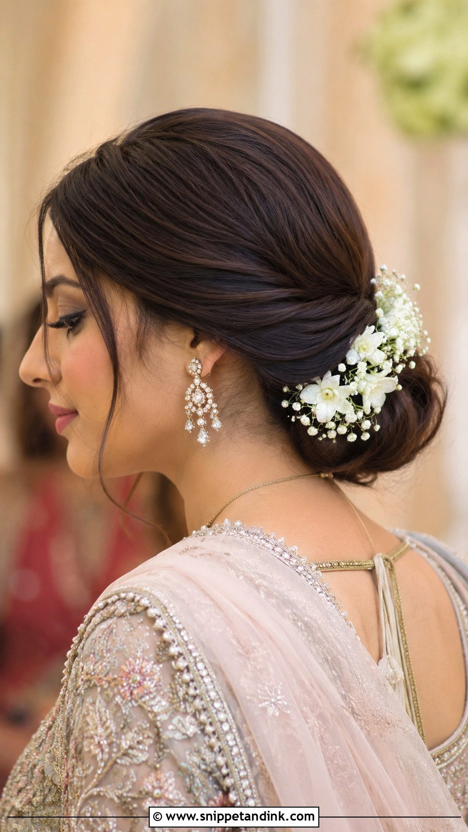 Low Floral Bun for Nikah Bride - Snippet and Ink - 20 Nikah Bride Hairstyles