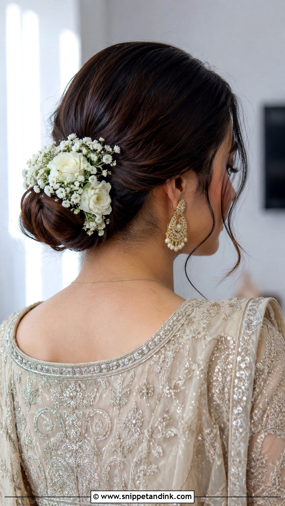 Low Floral Bun for Nikah - Snippet and Ink - 25 Muslim Bridal Hairstyles
