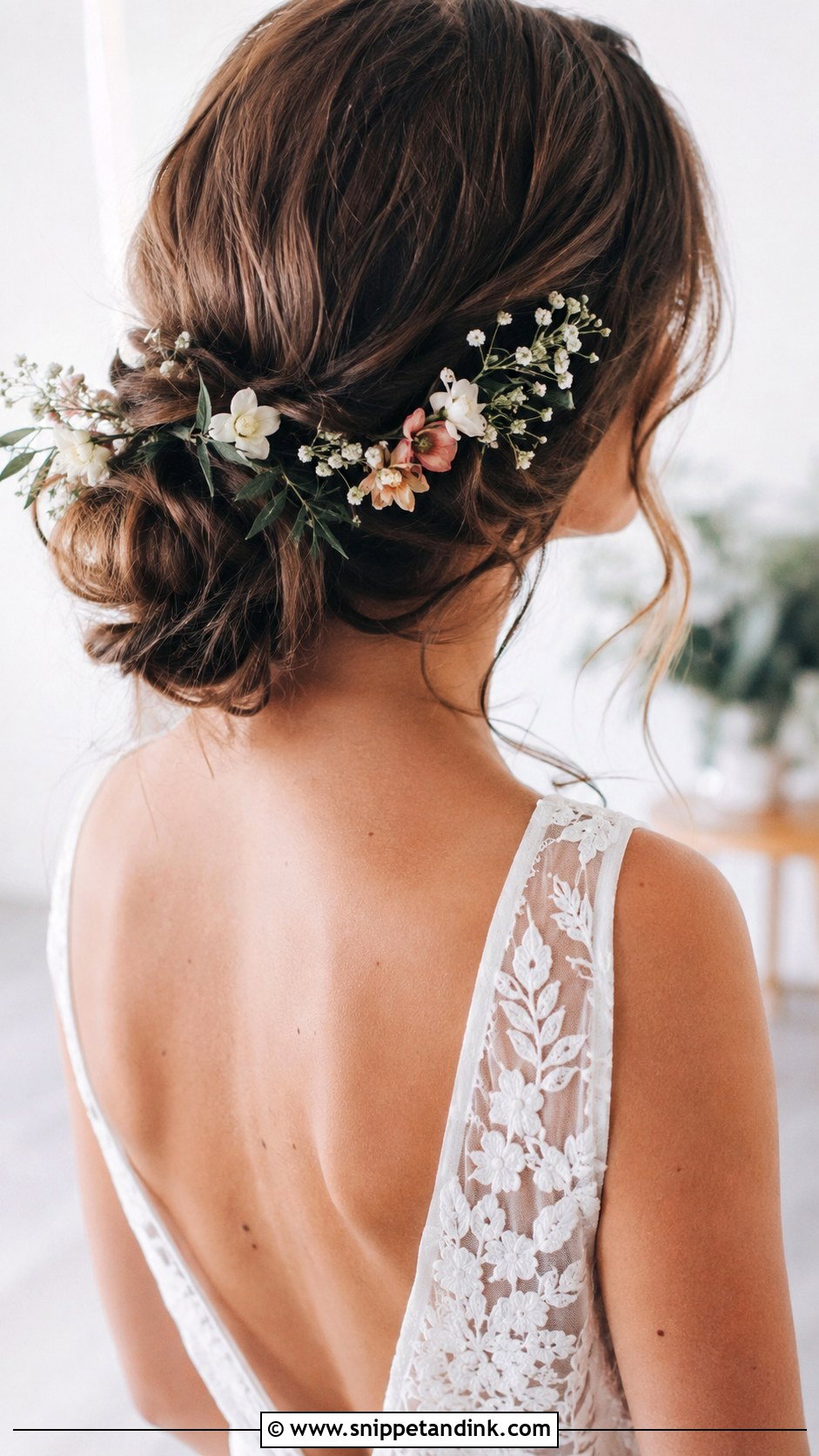 Low Floral Bun - Snippet and Ink - 20 Easy Hair for Wedding Guest Ideas
