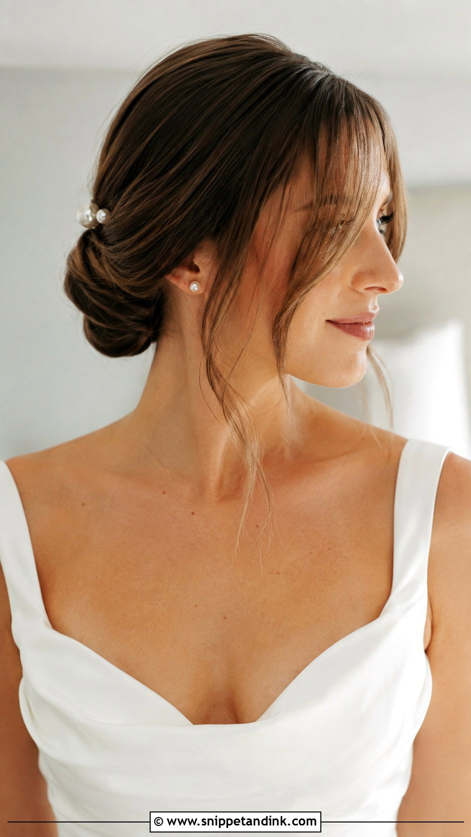 Low Knot With Curtain Bangs - Snippet and Ink - 20 Wedding Hair with Curtain Bangs Ideas
