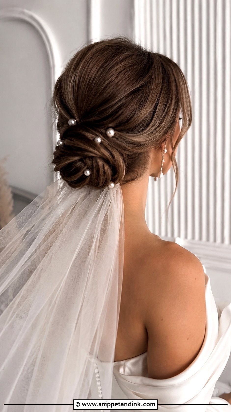 Low Knot With Pearls and Cathedral Veil - Snippet and Ink - 25 Cathedral Veil Hairstyle Ideas