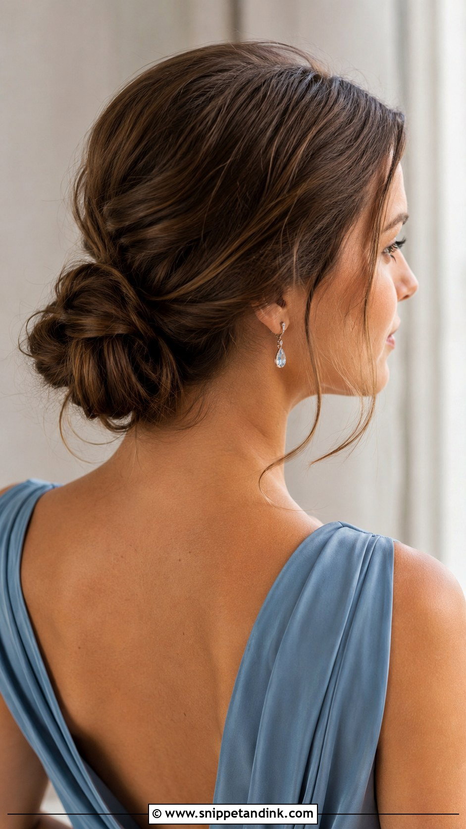 Low Knotted Bun - Snippet and Ink - 25 Wedding Guest Hair Updo Ideas