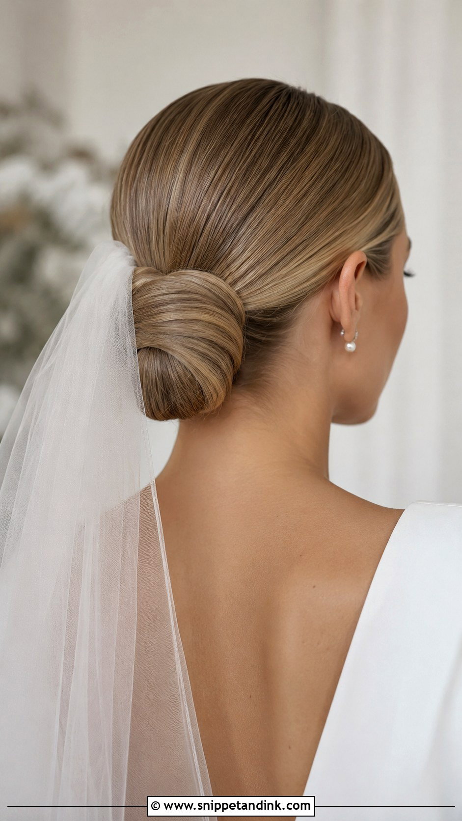 Low Knotted Bun - Snippet and Ink - 25 Medium Length Bridal Hair Ideas