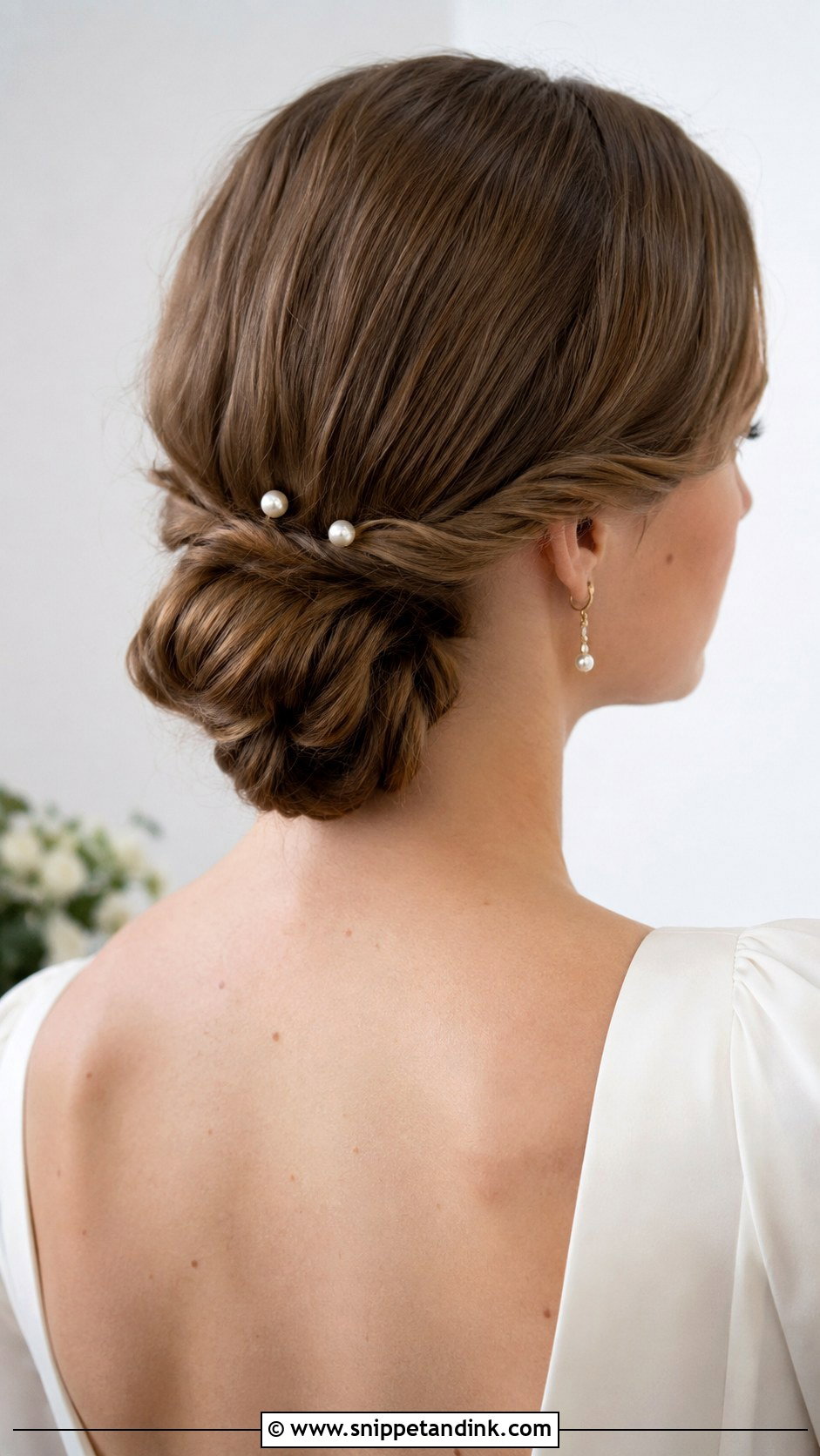 Low Knotted Bun for Short Hair - Snippet and Ink - 20 Short Hair Up Dos for Wedding