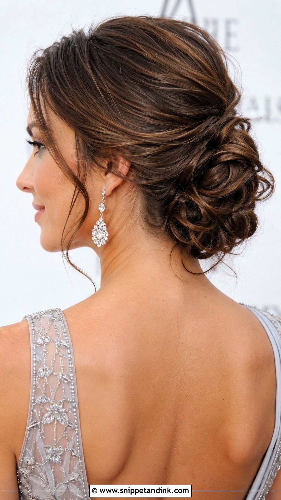 Low Knotted Updo - Snippet and Ink - 30 Hair Styles for Long Hair for Weddings