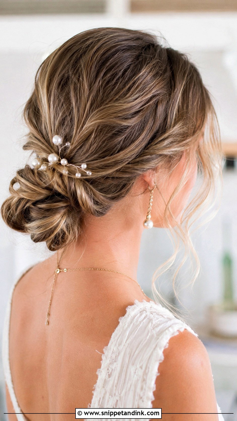 Low Knotted Updo - Snippet and Ink - 30 Straight Hair Hairstyles for Wedding