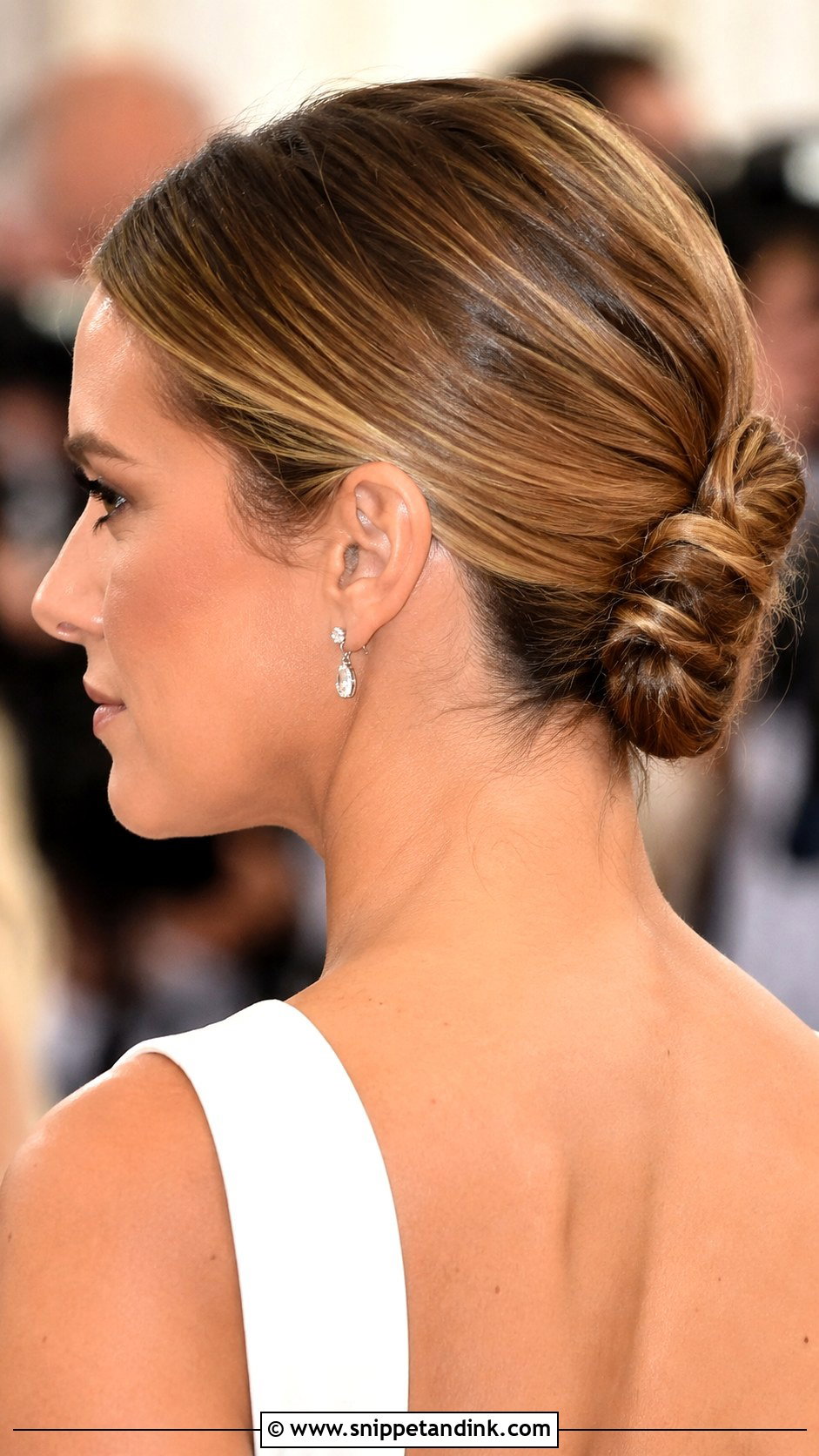 Low Knotted Updo - Snippet and Ink - 30 Wedding Guest Updo Hairstyles