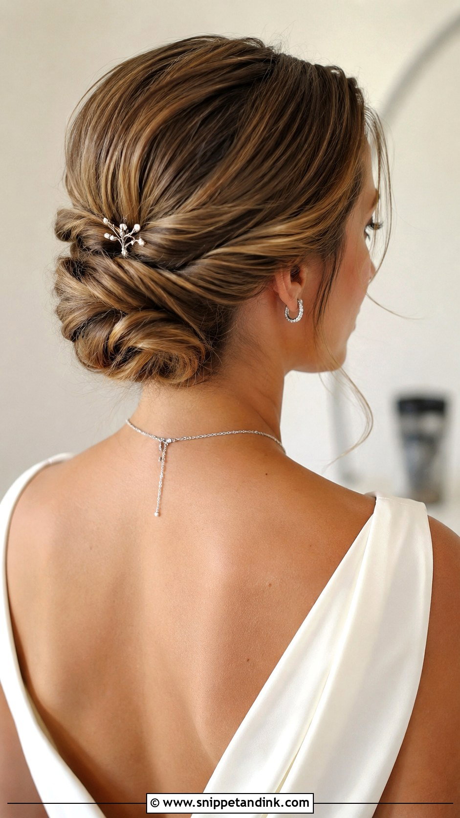 Low Knotted Updo for Brides - Snippet and Ink - 25 Bridal Hair Inspo Ideas