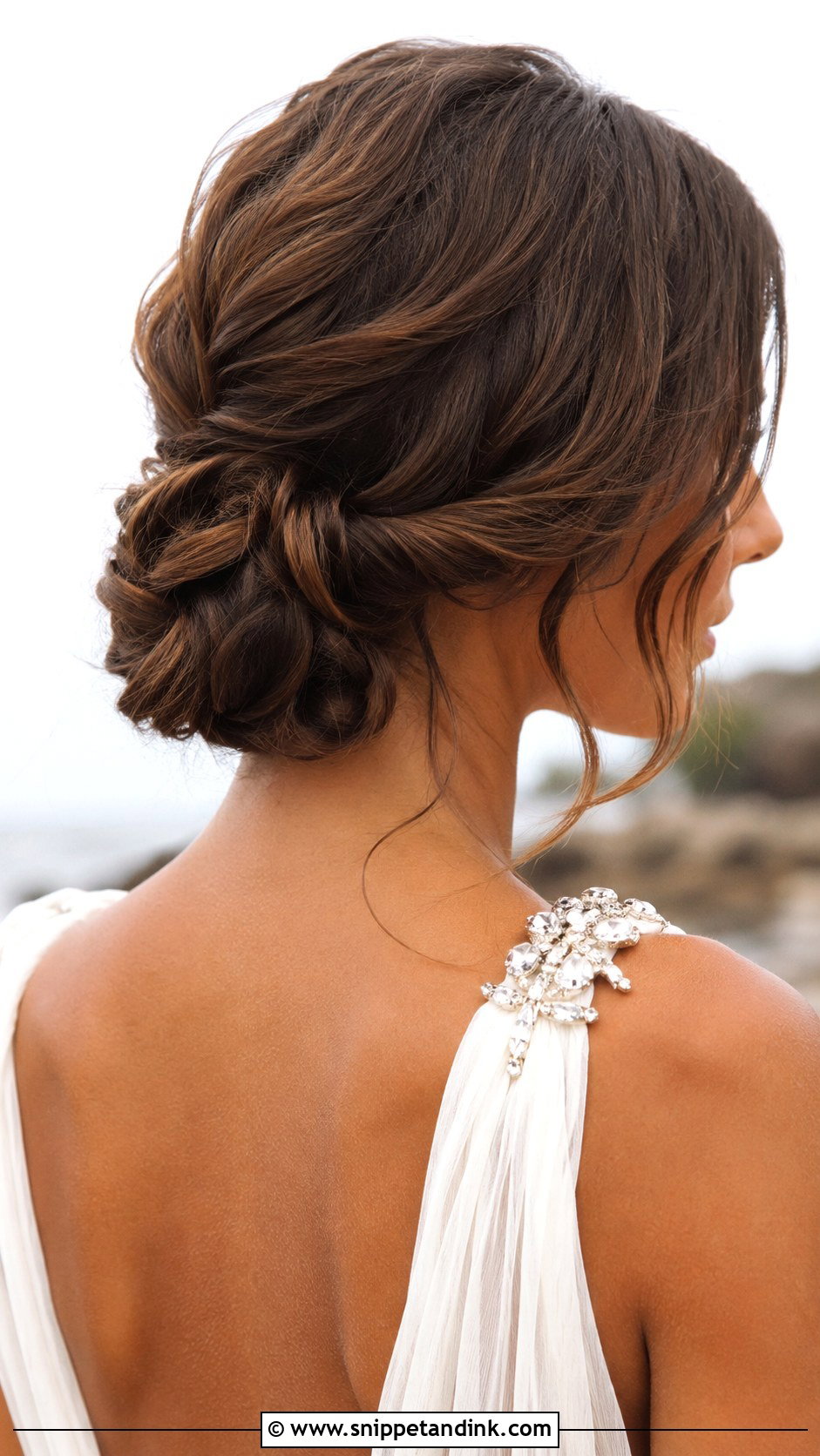 Low Knotted Updo - Snippet and Ink - 20 Beach Wedding Hairstyles for Long Hair