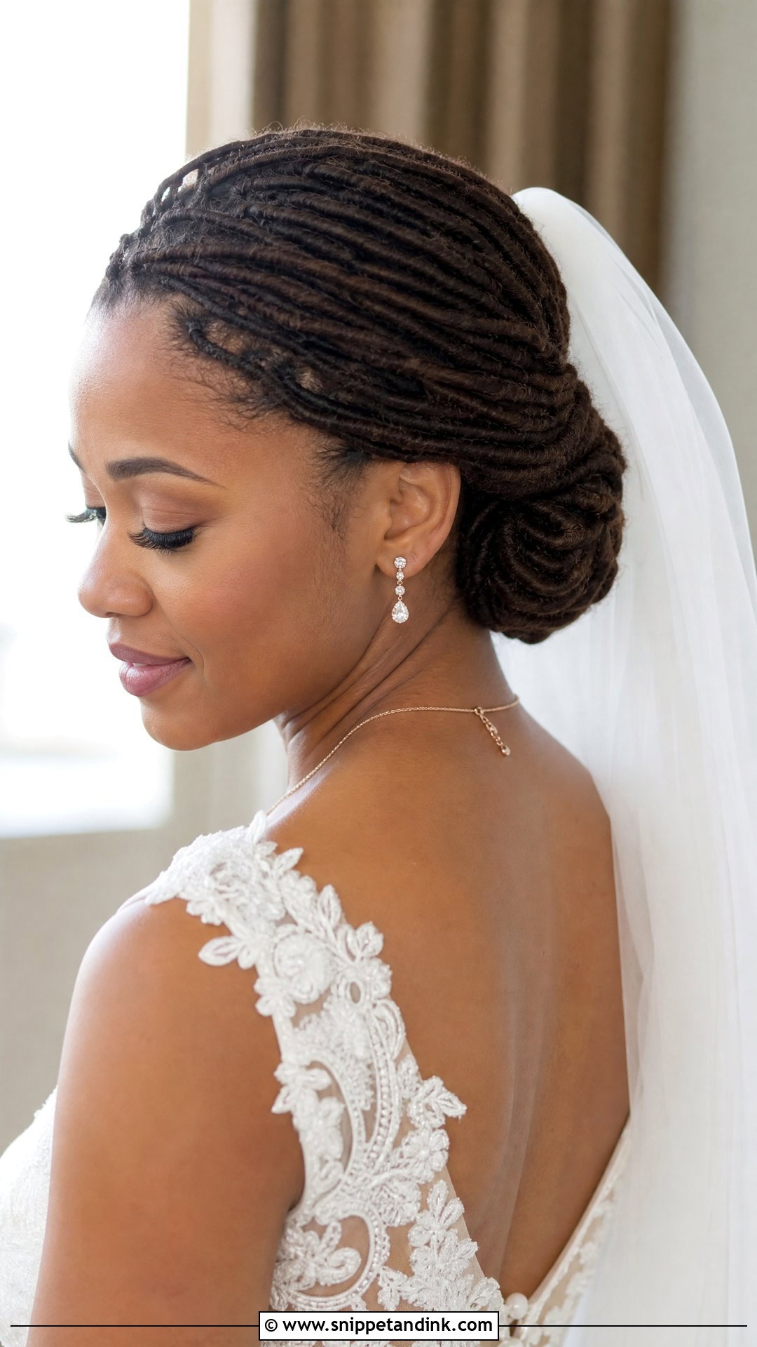 Low Loc Bun With Veil - Snippet and Ink - 25 Bridal Dreadlock Hairstyles