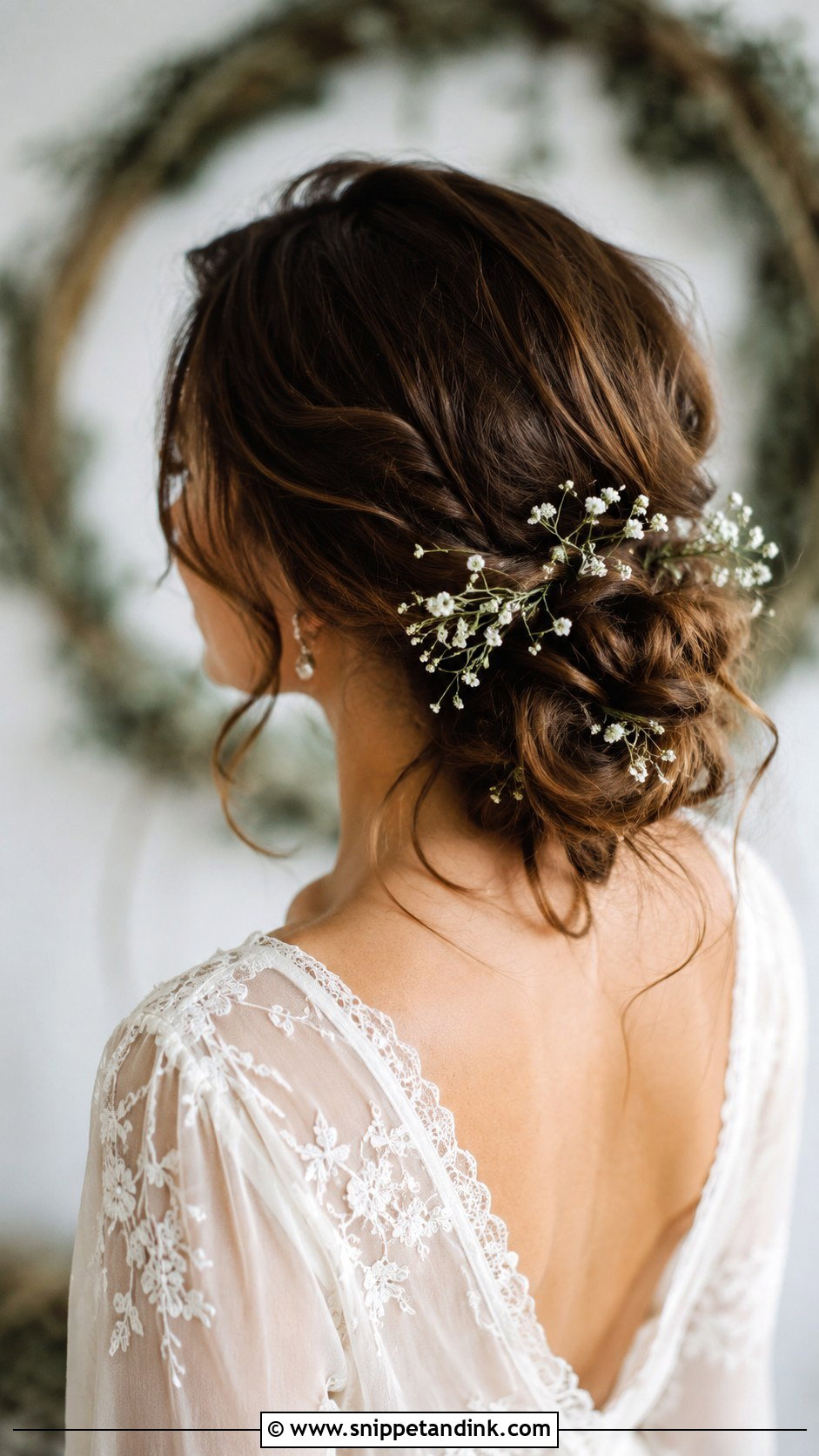 Low Messy Bun With Babys Breath - Snippet and Ink - 30 Low Messy Bun Wedding Hair Ideas