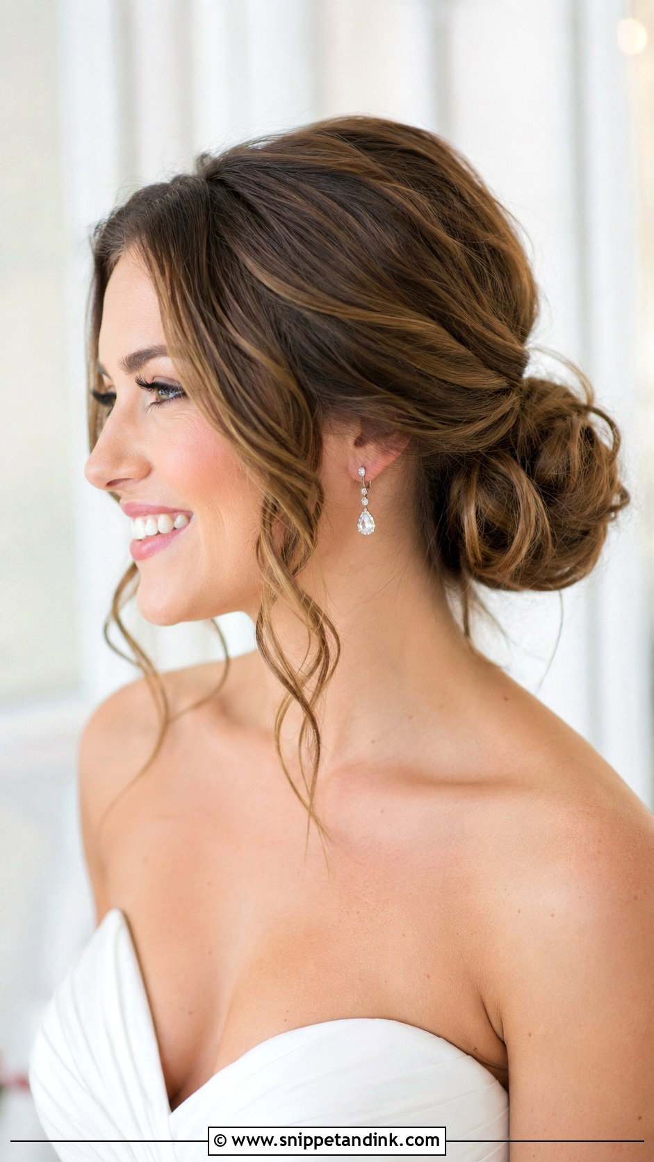 Low Messy Bun With Face Framing Tendrils - Snippet and Ink - 30 Low Messy Bun Wedding Hair Ideas