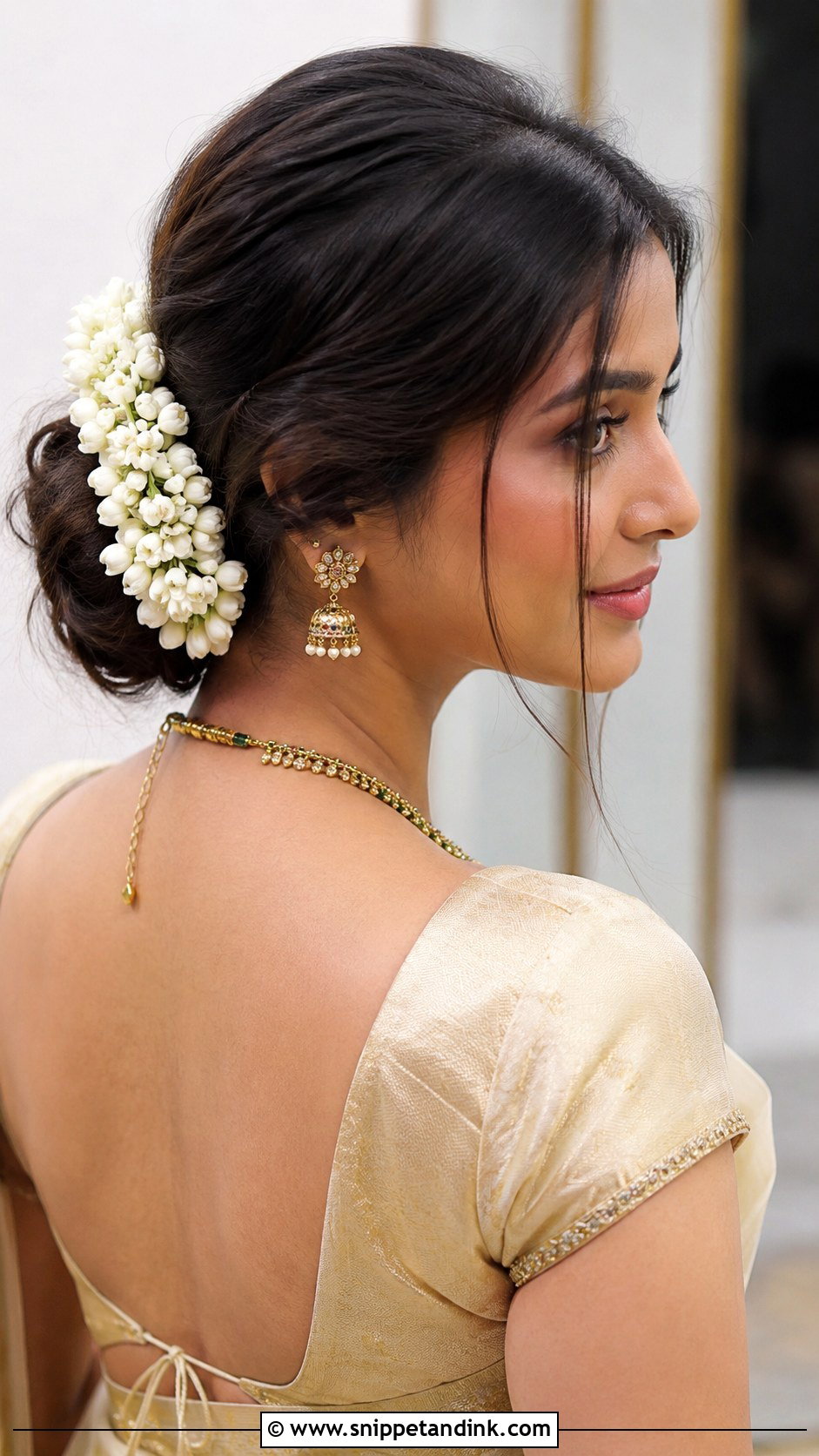 Low Messy Bun With Gajra - Snippet and Ink - 30 Indian Bridal Bun Hairstyles