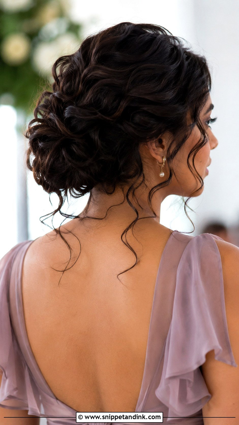 Low Messy Updo With Loose Curls - Snippet and Ink - 15 Low Messy Updo Wedding Ideas