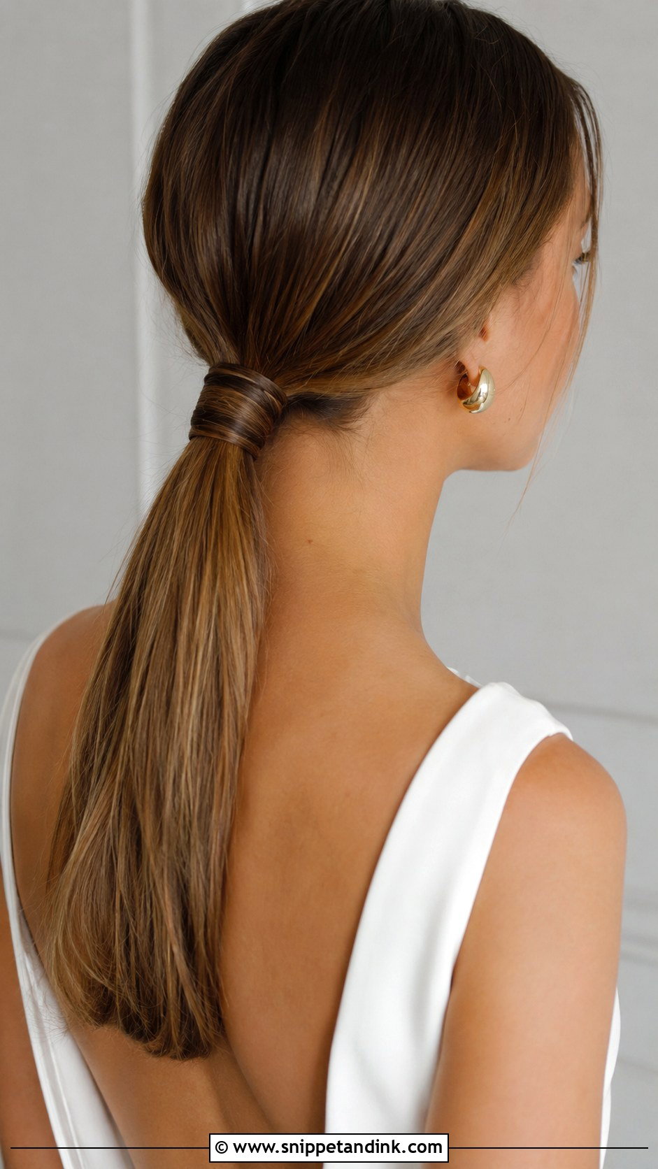 Low Ponytail With Hair Wrap - Snippet and Ink - 20 Bridal Low Ponytail Ideas