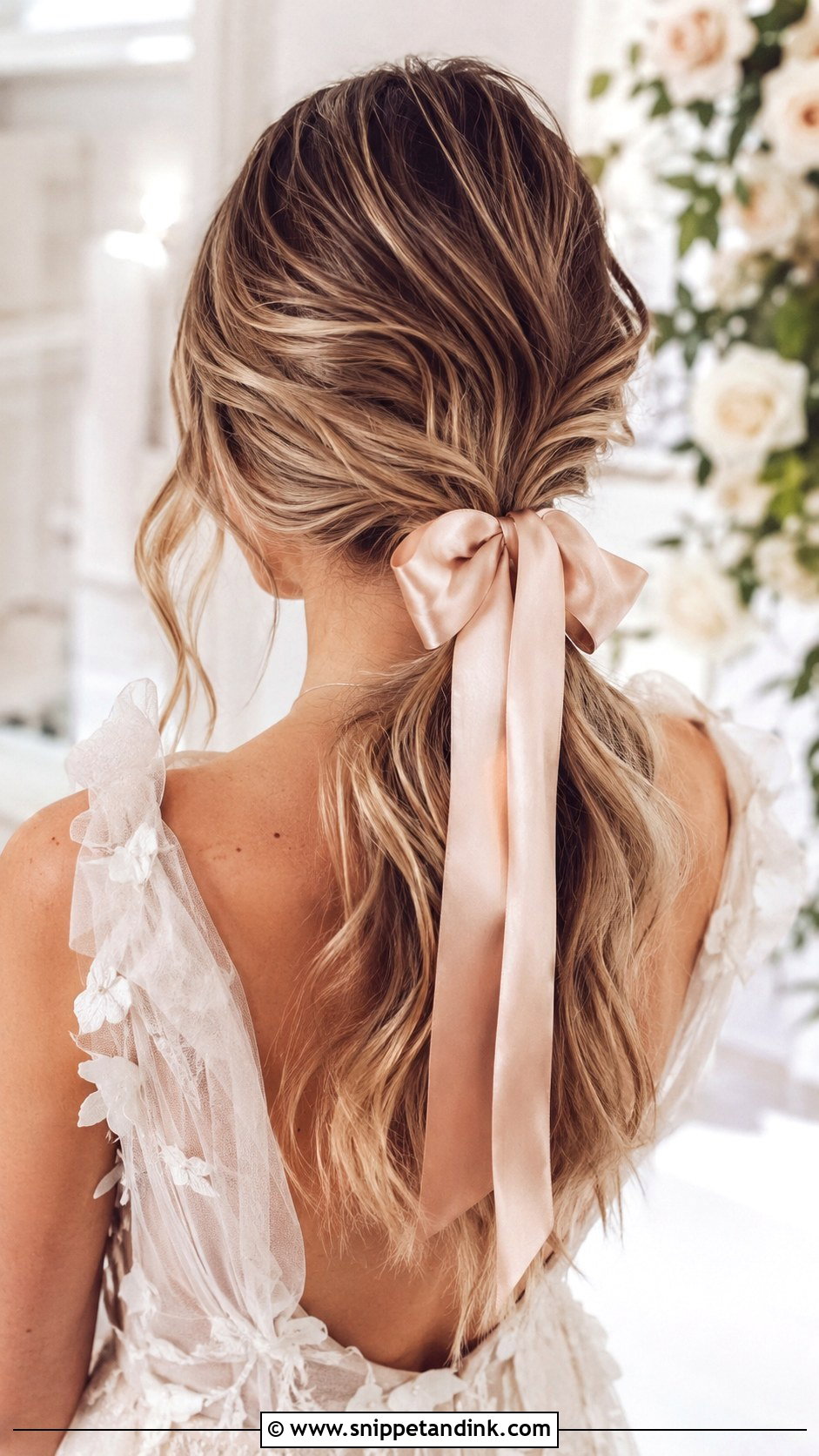 Low Ponytail With Ribbon Bow - Snippet and Ink - 20 Textured Ponytail Wedding Ideas