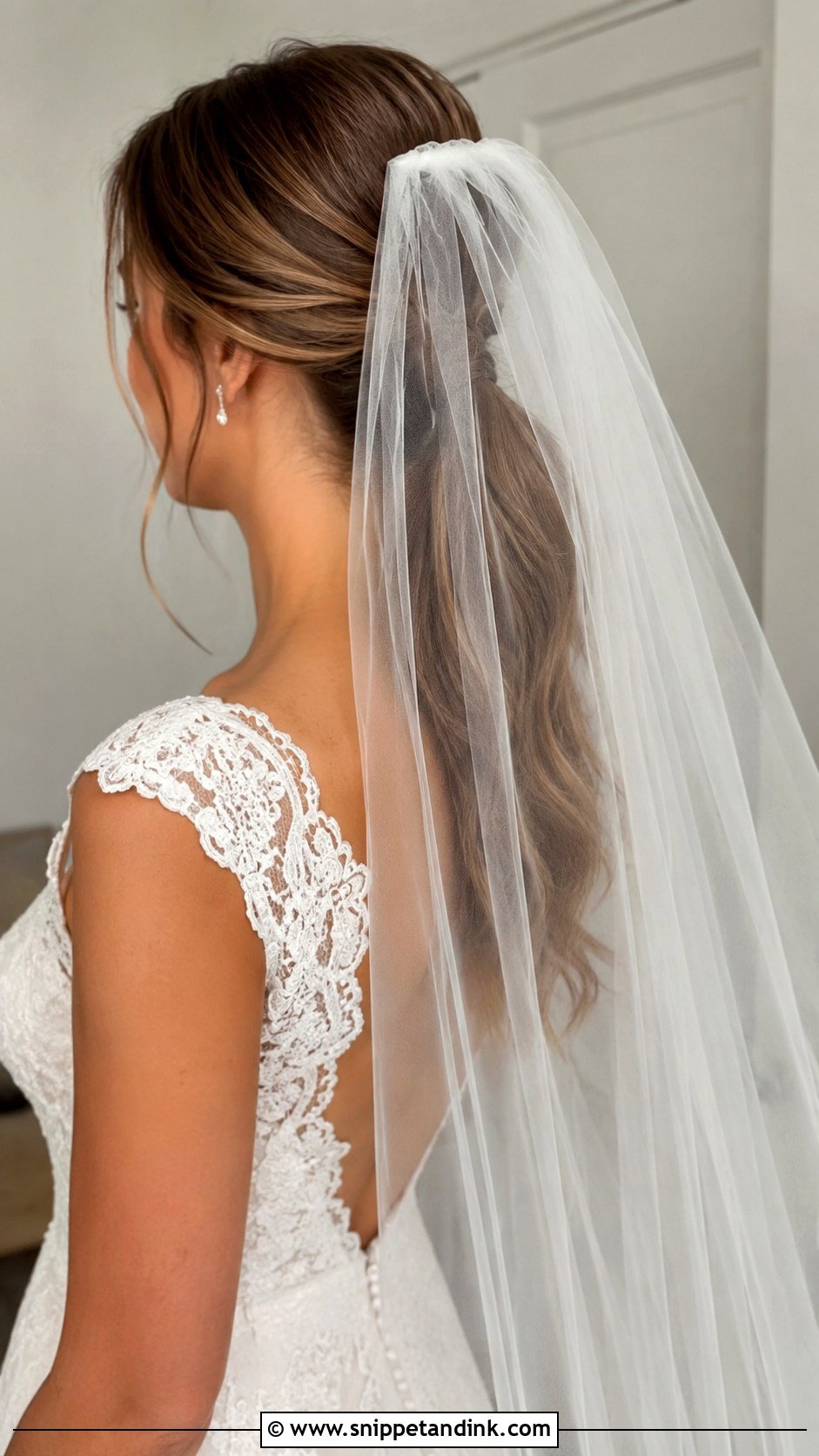 Low Ponytail With Veil - Snippet and Ink - 25 Low Ponytail Wedding Hair Ideas