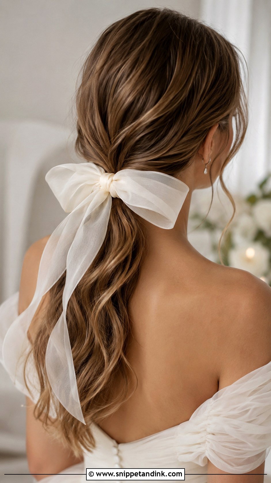 Low Ponytail With a Bow - Snippet and Ink - 20 Loose Ponytail Wedding Hairstyles