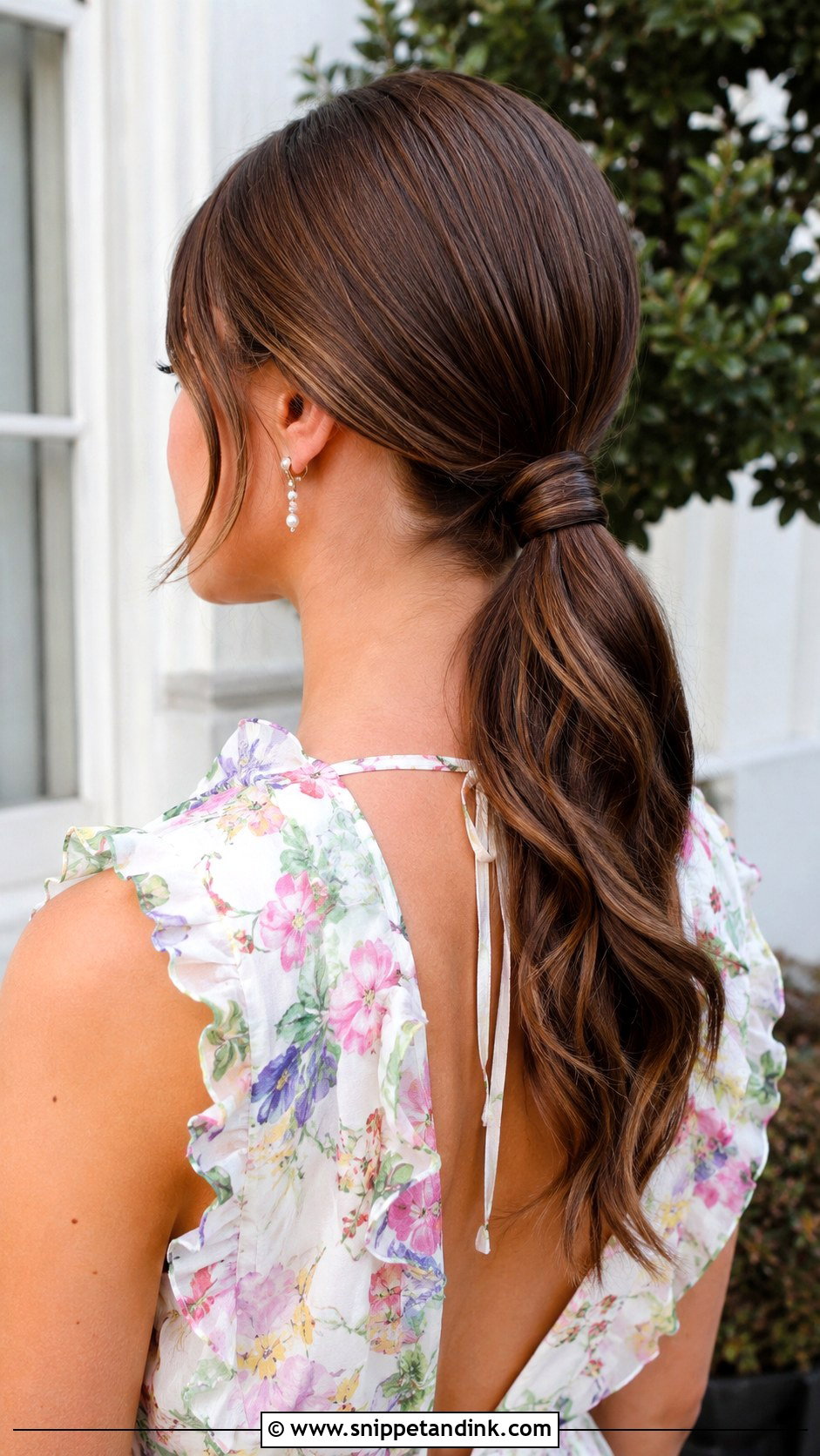 Low Ponytail With a Wrapped Base - Snippet and Ink - 25 Wedding Hairstyles for Guests