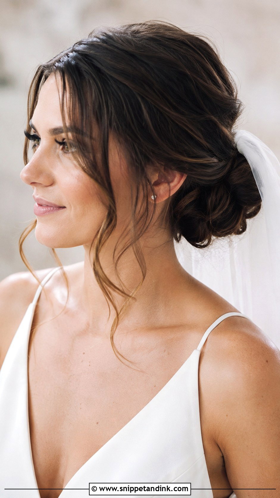 Low Side Bun With Face Framing Tendrils - Snippet and Ink - 20 Low Side Bun Wedding Hair Ideas