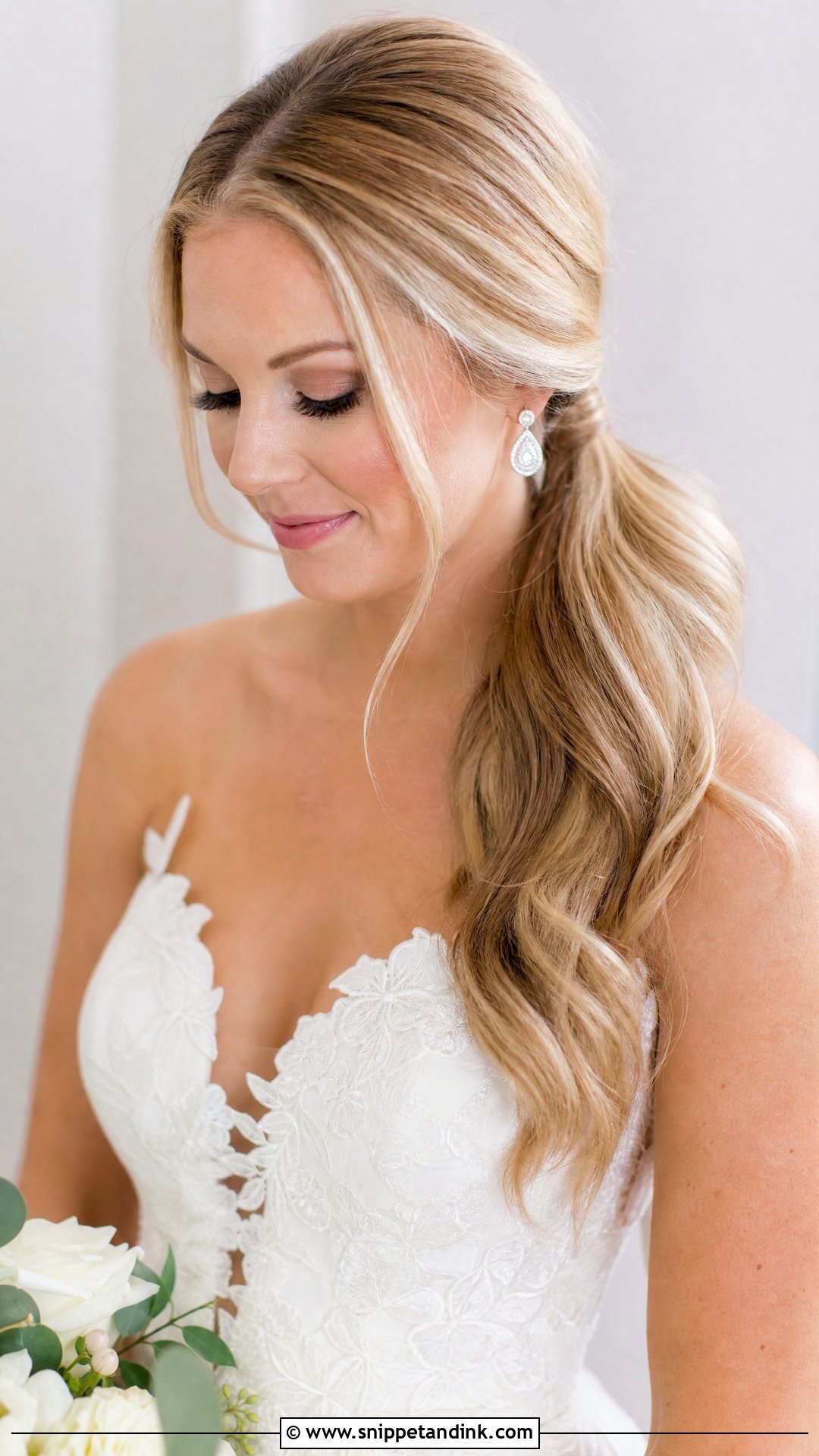 Low Side Ponytail With Loose Waves - Snippet and Ink - 25 Side Ponytail Wedding Hairstyles