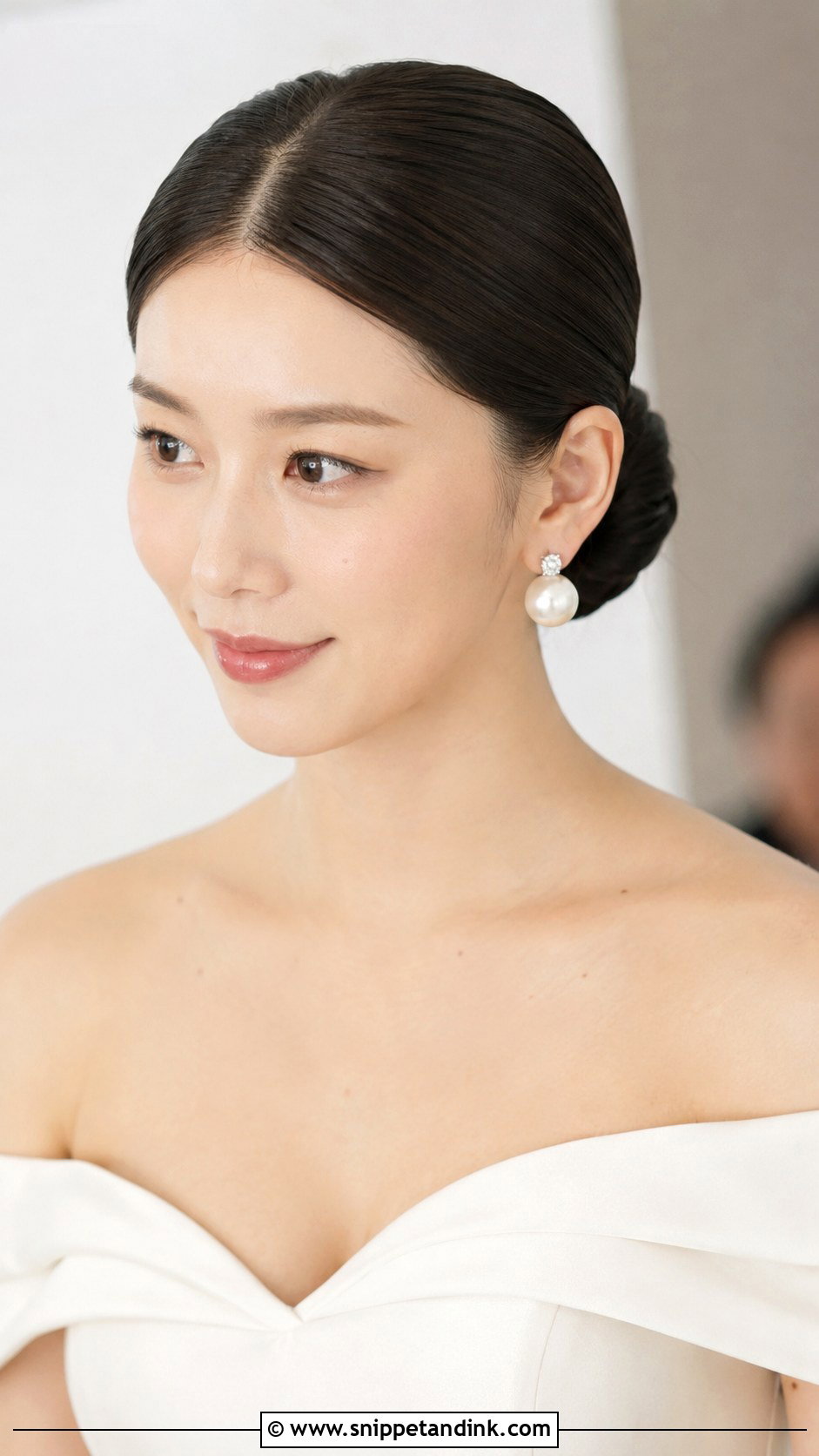 Low Sleek Bun Wedding Hairstyle - Snippet and Ink - 15 Low Updo Wedding Hairstyles