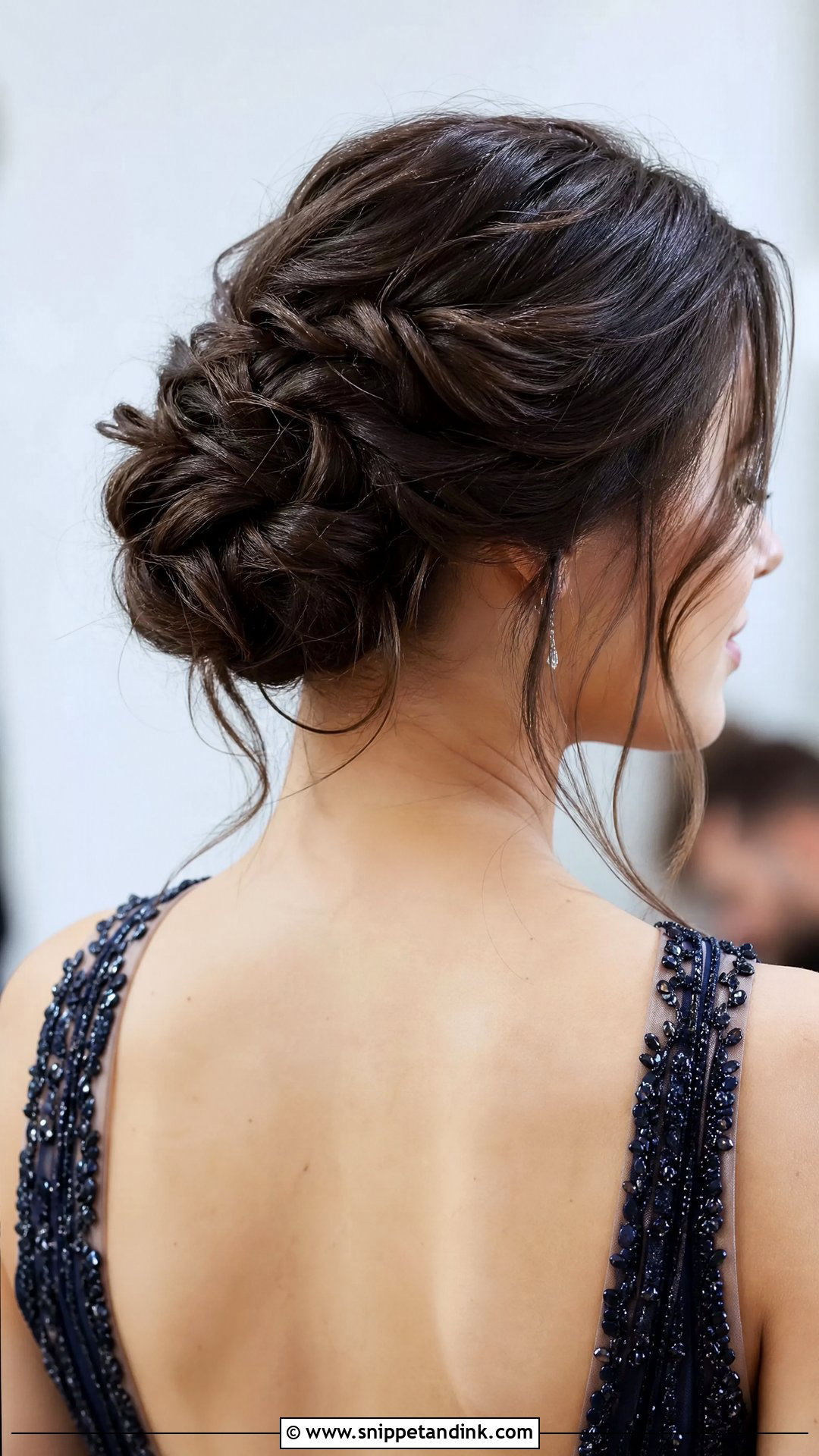 Low Twisted Bun - Snippet and Ink - 20 Easy Hairstyles for a Wedding Guest