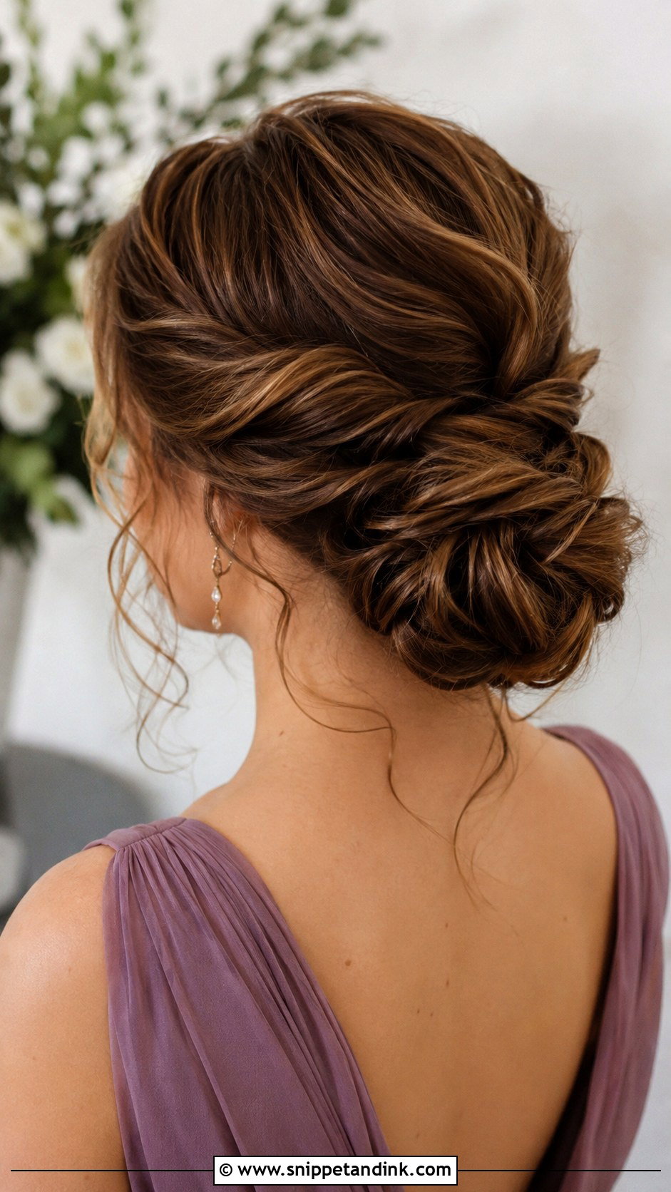 Low Twisted Bun - Snippet and Ink - 25 Mother of the Bride Hair Updo Ideas